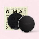 Jo Malone London English Pear & Freesia Scent To Go with packaging on a light pink background