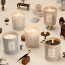 Multiple Jo Malone London Limited Edition Little Greene Collection scented candles on a white surface with decorative items around.