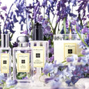 BEAUTE KNOWS Jo Malone Wild Bluebell collection products with lavender flowers in the background