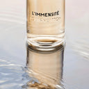 BEAUTE KNOWS Louis Vuitton L'Immensité Eau De Parfum 100ml perfume bottle on a reflective surface