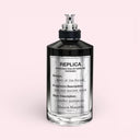 Maison Margiela Replica Fantasies Soul of The Forest Eau De Parfum 100ml bottle with label on a pink background