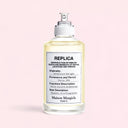 Maison Margiela Replica Afternoon Delight Eau de Toilette 100ml perfume bottle on light pink background