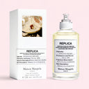 Maison Margiela Replica Afternoon Delight Eau de Toilette 100ml perfume bottle and packaging on light pink background