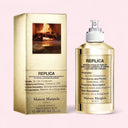 Maison Margiela Replica By the Fireplace Eau de Toilette - Limited Edition 100ml perfume bottle and packaging box on light neutral pink background