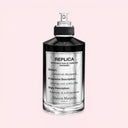 BEAUTE KNOWS Maison Margiela Replica Celestial Whisper perfume bottle on a pink background