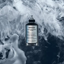 BEAUTE KNOWS Maison Margiela Replica Celestial Whisper perfume bottle with smoke effect in the background