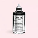 Maison Margiela Replica Fantasies Dancing On The Moon Eau de Parfum 100ml perfume bottle on a light pink background
