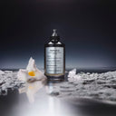 Maison Margiela Replica Fantasies Dancing On The Moon Eau de Parfum 100ml perfume on a reflective surface with a dark background