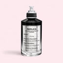Maison Margiela Replica Fantasies Flying Eau de Parfum 100ml perfume bottle on light pink background