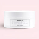 BEAUTE KNOWS White Maison Margiela Replica Lazy Sunday Morning Body Scrub 200ml container with a label on a pink background