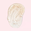 BEAUTE KNOWS Maison Margiela Replica Lazy Sunday Morning Body Scrub smear on a pink background