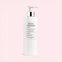 BEAUTE KNOWS White Maison Margiela Replica Lazy Sunday Morning Shower Gel bottle with pump on a pink background