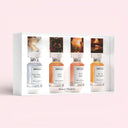 Set of four Maison Margiela Replica Mini 7ml bottles in a box with images on a pink background
