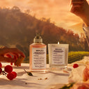 Maison Margiela Replica On A Date Eau de Toilette perfume bottle and candle with romantic sunset background