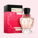 Miu Miu Twist Eau de Parfum 100ml perfume bottle and packaging on a light pink background