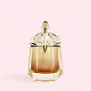 Luxurious Mugler Alien Goddess Intense Eau de Parfum 30ml perfume bottle with a decorative cap on a light pink background