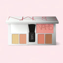 NARS Light Reflecting™ Ultimate Face Palette Limited Edition with six color swatches and a brush on a pink background