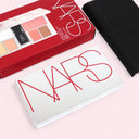 NARS Light Reflecting™ Ultimate Face Palette Limited Edition packaging on a pink background