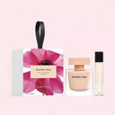 Narciso Rodriguez Narciso Eau de Parfum Poudrée 90ml Gift Set with packaging on a pink background