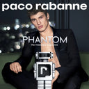 Paco Rabanne Phantom Eau de Toilette fragrance advertisement with a man in a suit and a detailed perfume bottle.