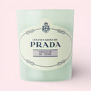 Light green Les Infusions De Prada Infusion De Cèdre Candle 165g jar on a light pink background