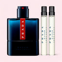 Prada Luna Rossa Ocean Eau de Toilette 100ml Set perfume bottle and two travel-sized bottles on a light pink background