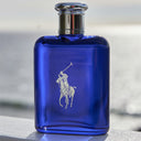 Ralph Lauren Polo Blue Eau de Toilette perfume bottle with silver cap on a blurred background