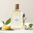 Ralph Lauren Polo Earth Eau de Toilette 100ml perfume bottle with wooden cap, lemon, lavender, and white flowers on a light background
