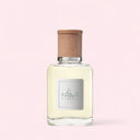 Ralph Lauren Polo Earth Eau de Toilette 40ml perfume bottle with wooden cap on a light pink background