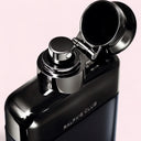 Close up of Ralph Lauren Ralph's Club Eau de Parfum 100ml nozzle with chrome accents on a pink background