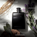 Ralph Lauren Ralph's Club Eau de Parfum 100ml perfume bottle with dried lavender and vetiver on a light background