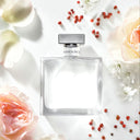 Ralph Lauren Romance For Women Eau de Parfum 100ml perfume bottle surrounded by flowers and berries on a white background