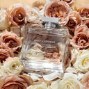 Ralph Lauren Romance For Women Eau de Parfum 100ml perfume bottle surrounded by roses