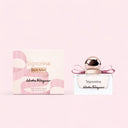 Salvatore Ferragamo Signorina Eau de Parfum 30ml perfume bottle and packaging on a pink background