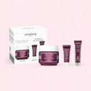 Sisley skincare products on a pink background