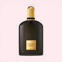 BEAUTE KNOWS Black matte Tom Ford Black Orchid Reserve Parfum 100ml perfume bottle with gold cap on a light neutral pink background