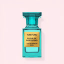 BEAUTE KNOWS Aqua Blue Tom Ford Fleur De Portofino Eau De Parfum 50ml perfume bottle on a light pink background