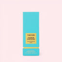 BEAUTE KNOWS Aqua blue coloured Tom Ford Fleur De Portofino Eau De Parfum 50ml perfume packaging box on a light pink background