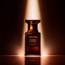 BEAUTE KNOWS Brown Tom Ford Myrrhe Mystère Eau De Parfum 50ml perfume bottle in a dimly lit setting