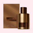 Tom Ford Oud Minérale Eau de Parfum 100ml perfume bottle and packaging on a light pink background