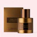Tom Ford Oud Minérale Eau de Parfum 50ml perfume bottle and packaging on a light pink background