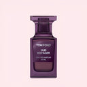 BEAUTE KNOWS purple Tom Ford Oud Voyager Eau De Parfum 50ml perfume bottle on a light pink background
