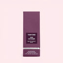BEAUTE KNOWS Purple Tom Ford Oud Voyager Eau De Parfum 50ml packaging box on a light pink background