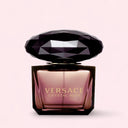 Versace Crystal Noir Eau de Toilette 30ml perfume bottle with a pink and black design on a light pink background