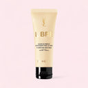 YSL Yves Saint Laurent Libre nourishing perfumed body balm tube on a light pink background