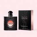 YSL Yves Saint Laurent Black Opium Eau de Parfum 50ml perfume bottle and packaging on a light pink background