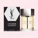 Yves Saint Laurent L'Homme Eau de Toilette 100ml perfume bottle and packaging on a light pink background