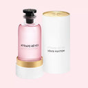 BEAUTE KNOWS Louis Vuitton Attrape-Rêves Eau De Parfum 100ml in a pink glass bottle with white cylindrical packaging.