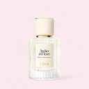 Chloé Atelier Des Fleurs Hibiscus Abelmoschus Eau De Parfum 50ml perfume bottle on a light pink background